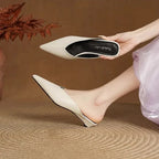 Mules in pelle Eneva